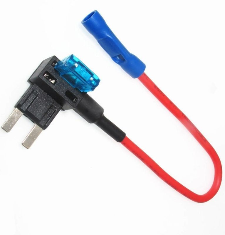 Le câblage automatique est équipé d'un adaptateur de robinet de fusible à lames de 12V